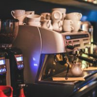Cups on top of coffee machine